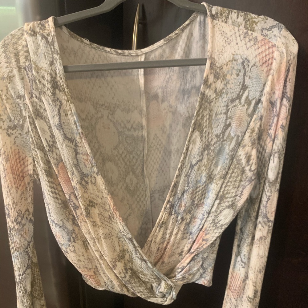 Top with plunging neckline, snakeskin print